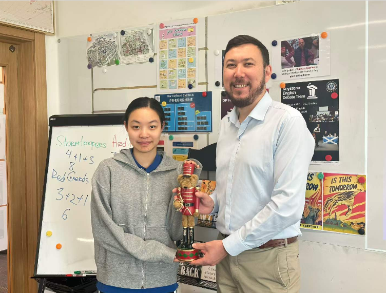 Rachel with a teacher during an academic activity